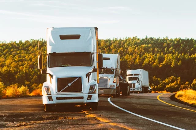 long hall trucks on the road shoulder