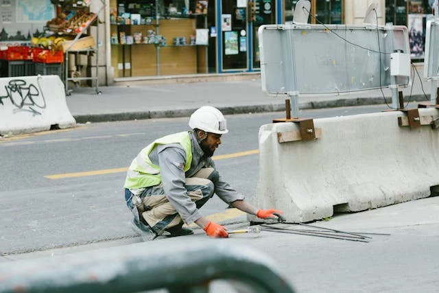 construction worker fixing the road